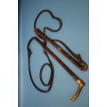 TWO VINTAGE HORSE WHIPS