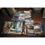 THREE TRAYS OF PAPERBACK NOVELS (TRAYS NOT INCLUDED)