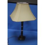A TABLE LAMP WITH SHADE