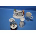 A COLLECTION OF ROYAL DOULTON "THE SNOWMAN" COLLECTABLES TO INCLUDE A CLOCK, A MUG, GLASS DOME ETC.