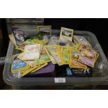 A BOX OF POKEMON CARDS AND TRADING CARD GAMES, BOOKS ETC.