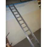 A DOUBLE 12 RUNG ALUMINIUM LADDER