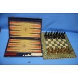 A CHESS SET TOGETHER WITH A BACKGAMMON SET