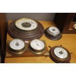 FOUR CIRCULAR BAROMETERS