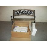 A CAST GARDEN BENCH AND A BATH RISER SEAT A/F