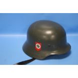 A REPRODUCTION GERMAN TYPE HELMET