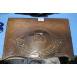 AN ART NOUVEAU CAST COPPER FIRE HOOD