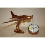 A MODERN DECORATIVE COPPER EFFECT MODEL OF AN AEROPLANE - WIDTH 56CM, HEIGHT 28CM - TOGETHER WITH