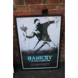 A LARGE FRAMED AND GLAZED BANKSY L'ARTE DELLA RIBELLIONE PRINT OVERALL SIZE INCLUDING FRAME -