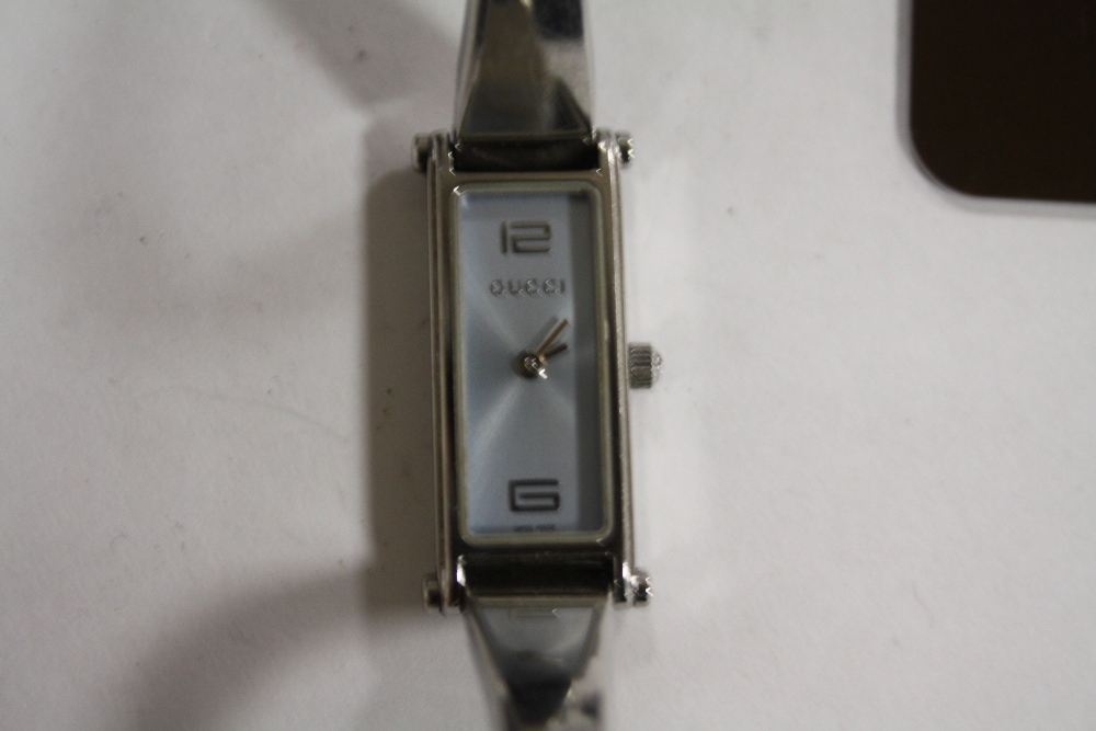 A BOXED LADIES GUCCI WRISTWATCH WITH WARRANTY PAPERS - Image 2 of 2