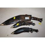 A SELECTION OF INDIAN KUKRI KNIVES WITH SCABBARDS