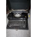 A VINTAGE CASED THRALE & BEAUMONT PORTABLE TYPEWRITER