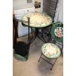 A FLORAL CIRCULAR GARDEN TABLE DIA. 70 CM WITH 2 MATCHING FOLDABLE CHAIRS