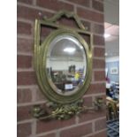 AN ORNATE BRASS WALL MIRROR WITH CANDLE SCONCES H-57 CM