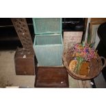 A LLOYD LOOM LUSTY LINEN BASKET, TOGETHER WITH A LARGE TWIN HANDLED LOG BASKET, MAHOGANY PURDONIUM