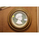 A GILT FRAMED AND GLAZED CAMEO PLAQUE - DIA 33 CM