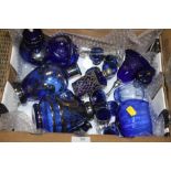 A COLLECTION OF BLUE GLASS TO INCLUDE SHOT GLASSES, VASES ETC