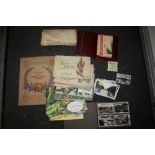 A COLLECTION OF CIGARETTE CARDS, MILITARY RATION BOOK ETC