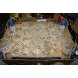 A TRAY OF CUT AND PRESSED GLASSWARE