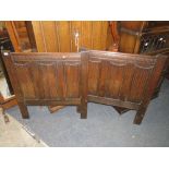 A PAIR OF CARVED OAK BED ENDS W-91 CM (2)