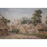 A FRAMED AND GLAZED WATERCOLOUR OF A CHURCH SIGNED E SNOWDEN - 35 CM BY 23.5 CM