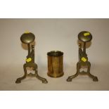 A PAIR OF BRASS FIRE DOGS TOGETHER WITH A TRENCH ART VASE (3)