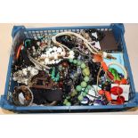 A SMALL TRAY OF COSTUME JEWELLERY