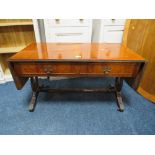 A YEW WOOD LOW SOFA TABLE