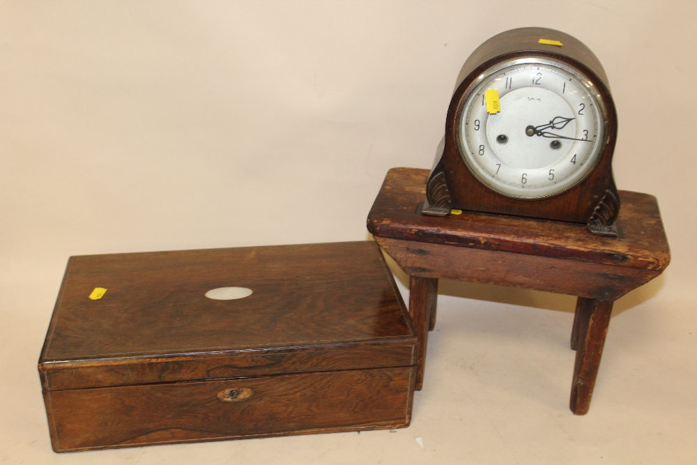 AN ANTIQUE ROSEWOOD WRITING SLOPE WITH MOTHER OF PEARL CARTOUCHE, TOGETHER WITH A SMALL WOODEN STOOL