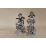 A LLADRO FIGURE OF A SEATED FEMALE WITH A WAND AND STARS, TOGETHER WITH A LLADRO FIGURE OF A YOUNG
