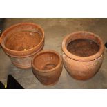 THREE TERRACOTTA PLANT POTS