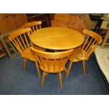 A MODERN CIRCULAR KITCHEN TABLE AND 4 CHAIRS