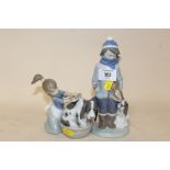 TWO LLADRO FIGURES OF A BOY AND GIRL WITH DOGS