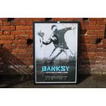 A LARGE FRAMED AND GLAZED BANKSY L'ARTE DELLA RIBELLIONE PRINT OVERALL SIZE INCLUDING FRAME -