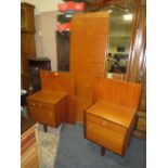 A RETRO PAIR OF TEAK BEDSIDE CABINETS WITH A HEADBOARD