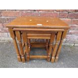 A SOLID OAK NEST OF TABLES W-51 CM LARGEST