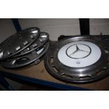 SIX HUBCAPS TO INCLUDE TWO MERCEDES EXAMPLES