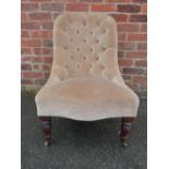 AN ANTIQUE BUTTON BACKED BEDROOM CHAIR