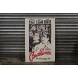 A REPRODUCTION CASA BLANCA FILM ADVERTISING PRINT ON BOARD, 67 X 98 CM