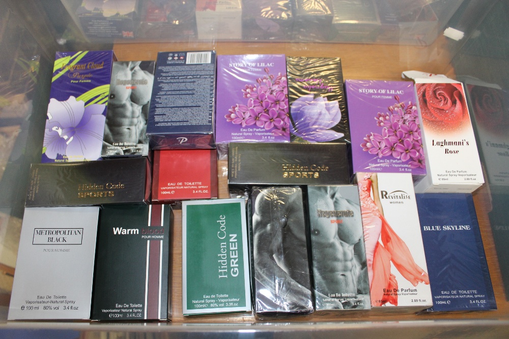 A BOX OF WOMENS & MENS PERFUMES