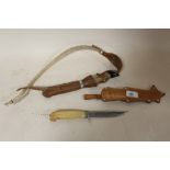 A TAXIDERMY HOOF HANDLED WHIP A/F TOGETHER WITH A J.MARTTIINI OF FINLAND KNIFE