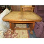 A VINTAGE OAK DINING TABLE