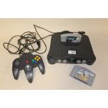 A NINTENDO 64 CONSOLE WITH 2 GAMES AND CONTROLLER A/F