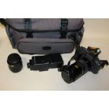 A YASHICA KYOCERA 320AF CAMERA IN CARRY CASE WITH ACCESSORIES