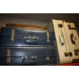 FIVE VINTAGE SUITCASES