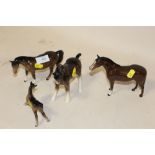 TWO BESWICK HORSES TOGETHER WITH ANOTHER AND A BESWICK FOAL