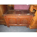 A 19TH CENTURY OAK TRIPLE PANEL COFFER W- 103 CM