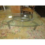 A MODERN GLASS TOPPED COFFEE TABLE WITH METAL BASE