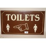 A PAINTED WOODEN TOILET SIGN - 46CM X 25.5CM