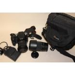 A SONY A100 DIGITAL CAMERA WITH CARRY CASE